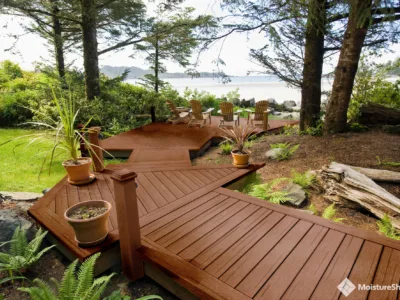 Wide and deep treated wood steps leading to the lake