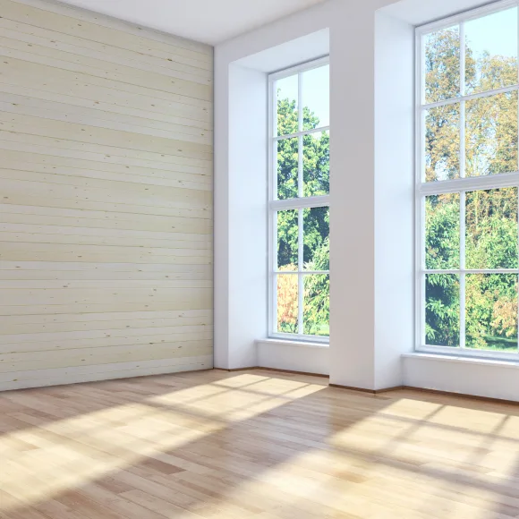 Beauty shoot of the inside of a new house with light coming in from the windows.