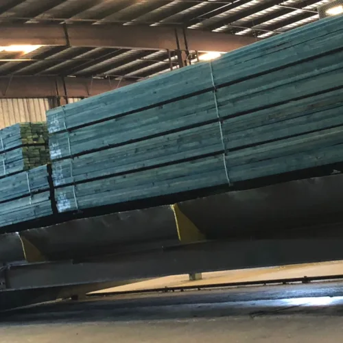 Stack of lumber treated with Advanceguard in a sawmill.