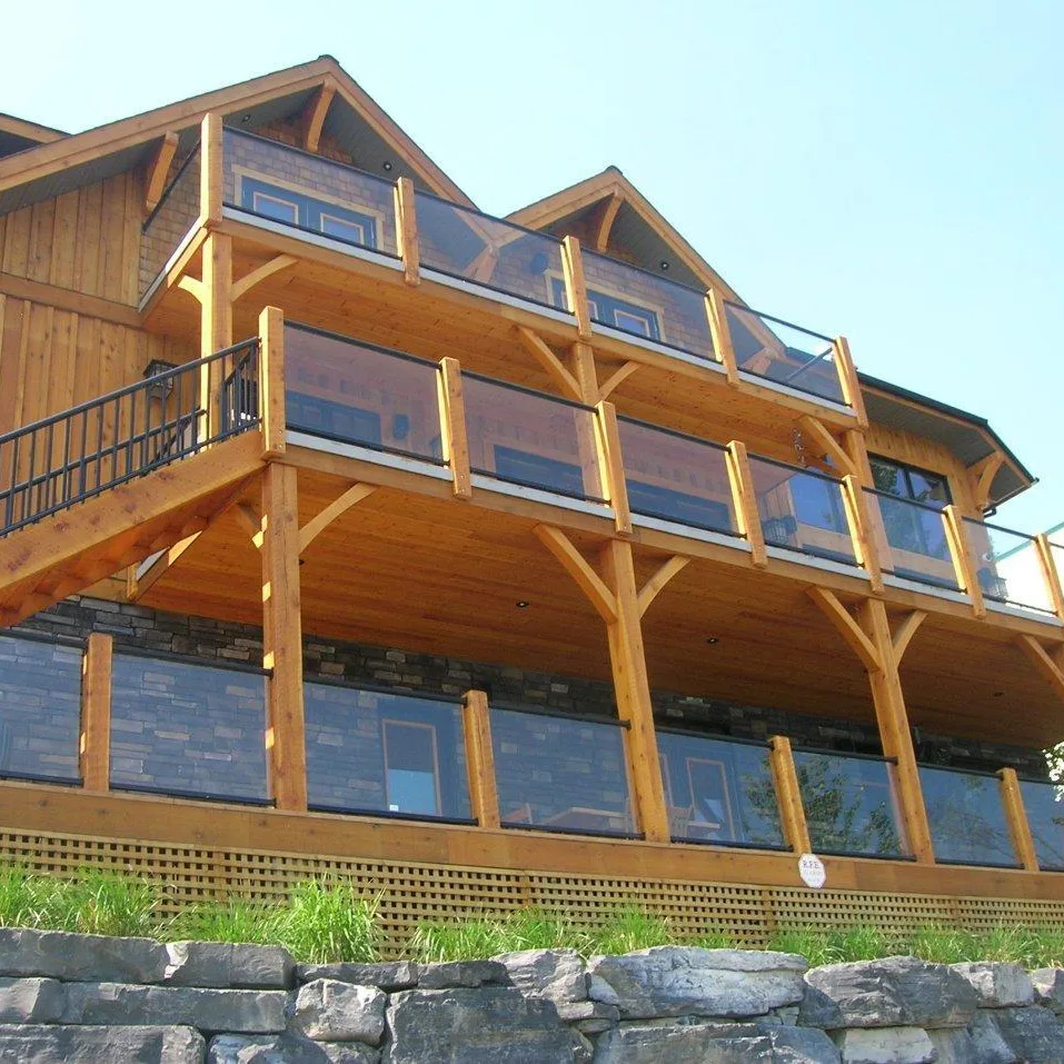 Century Aluminum Railings pipe railing on multi-dwelling wood balconies