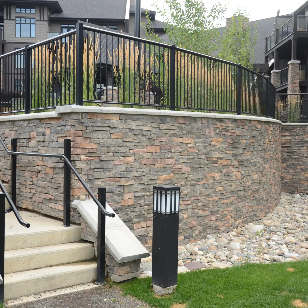 Century Aluminum Railings pipe railing on stonework