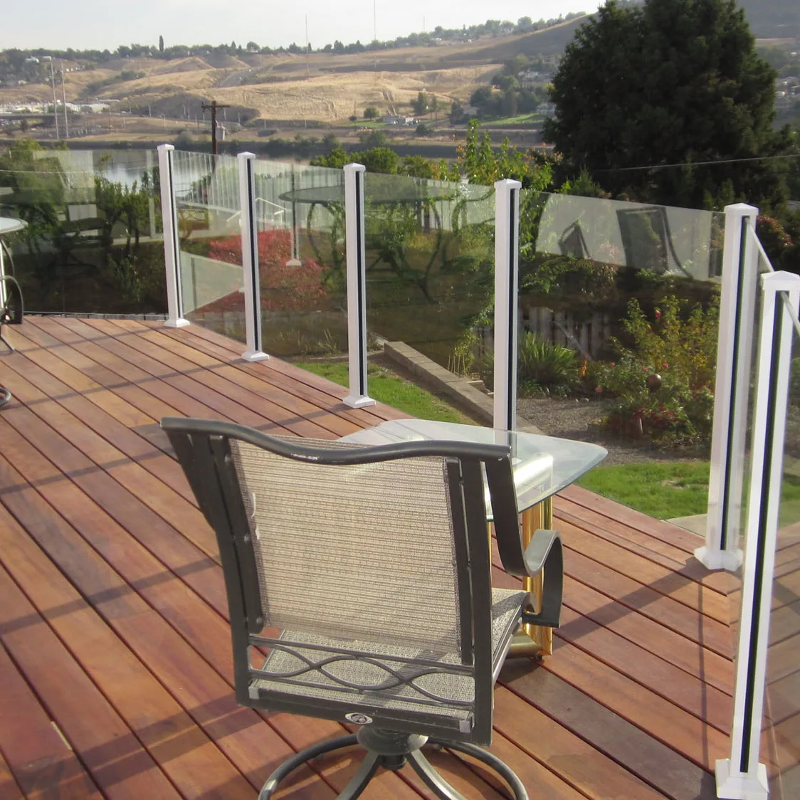 Century Aluminum Railings picket glass combo on a golf house