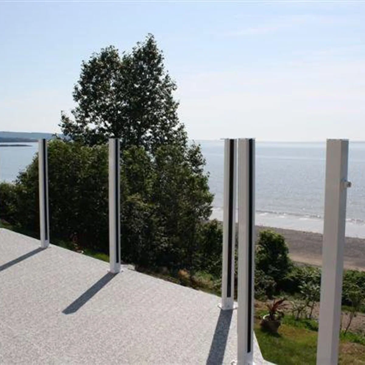 Century Aluminum Railings picket glass combo on a beach house