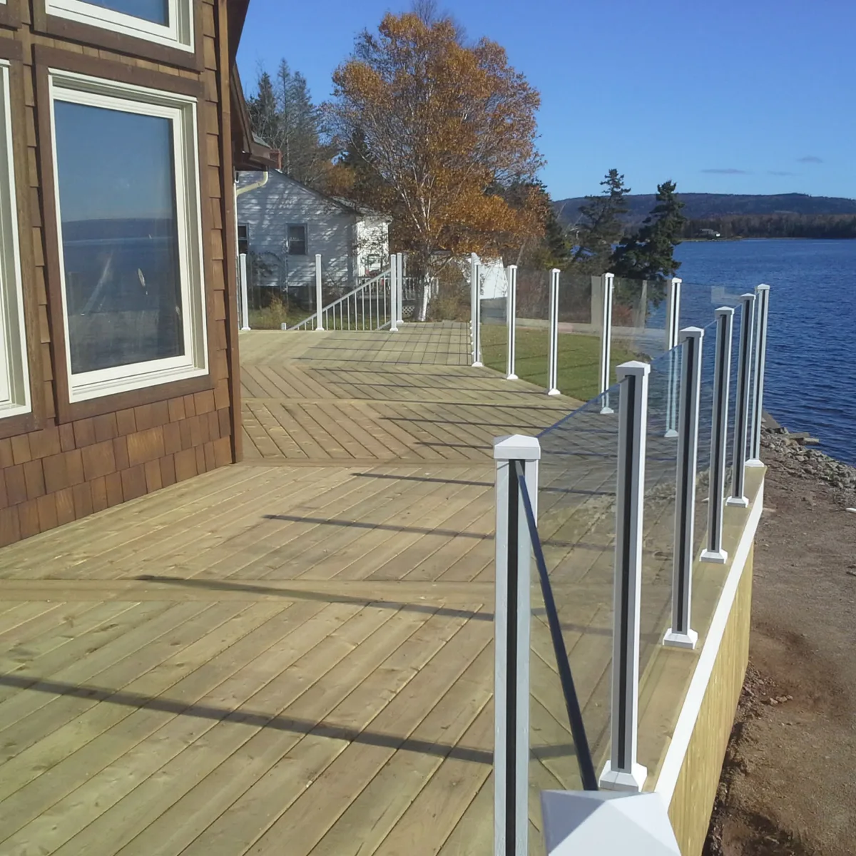 Century Aluminum Railings picket glass combo on a lake house