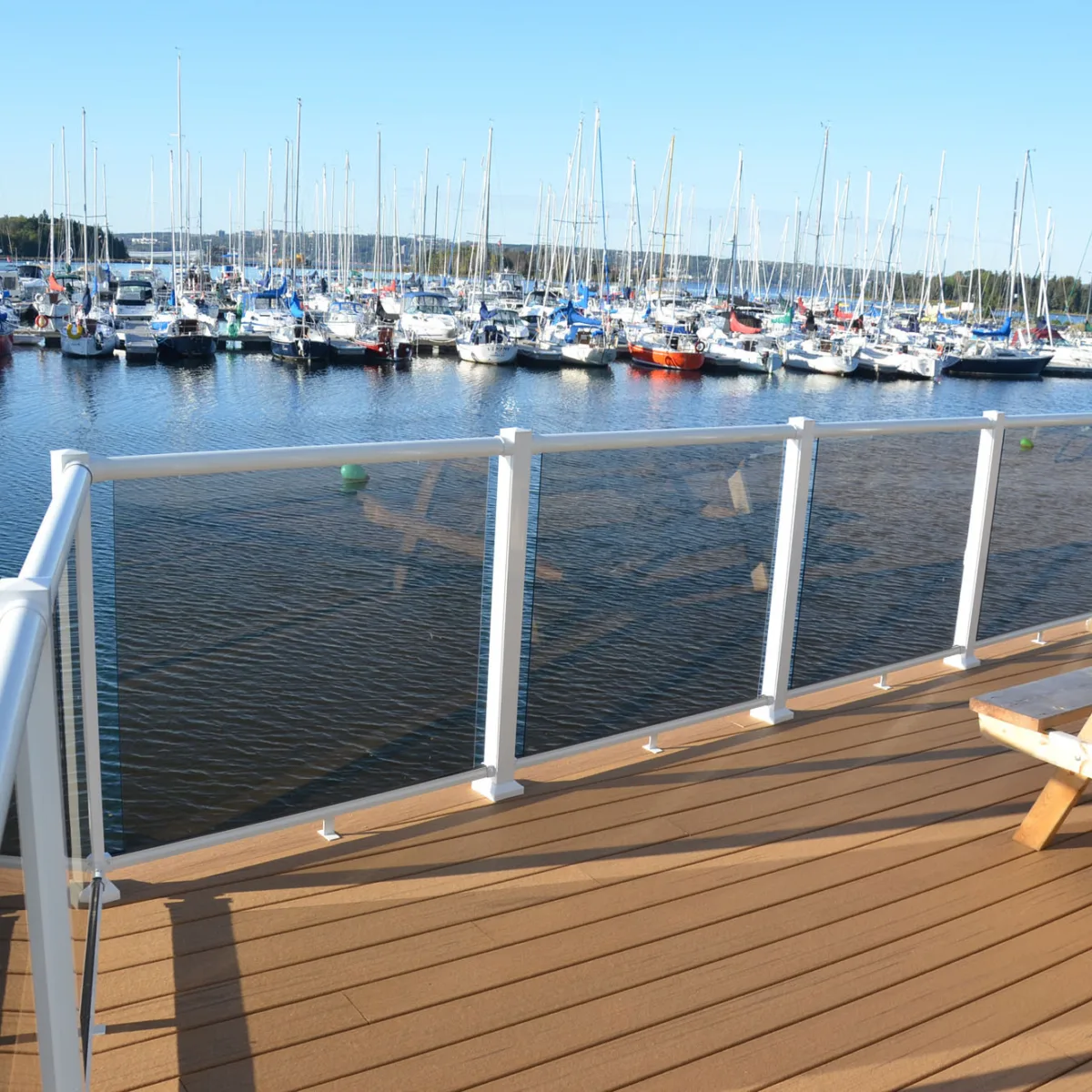 Century Aluminum Railings Glass Picket Combo Feature near a marina