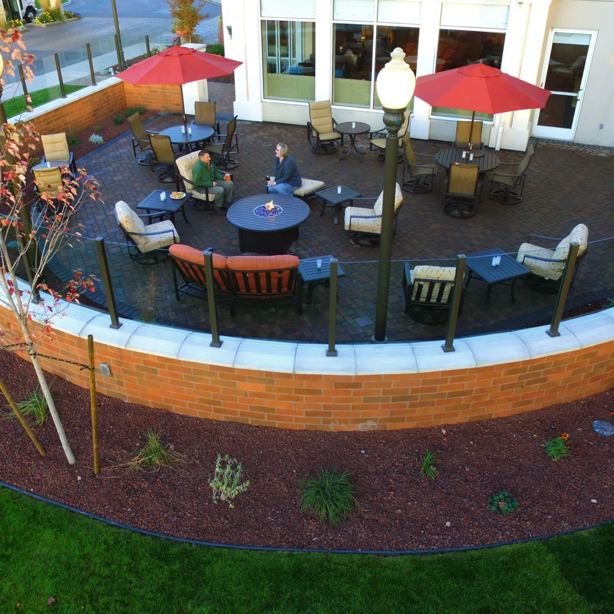 Century Aluminum Railings Glass Picket Combo Feature on a  round deck