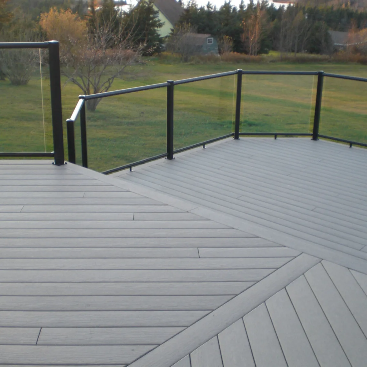 Century Aluminum Railings Glass Picket Combo Feature on a deck with stairs