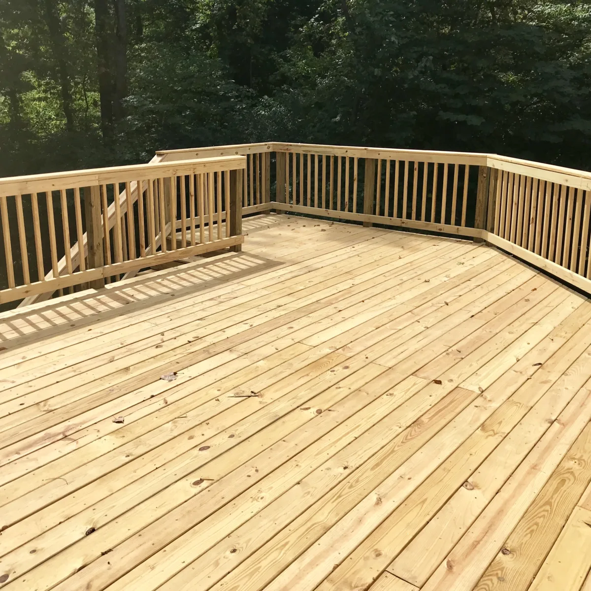 Southern Yellow Pine Decking Components - large backyard deck with rails and plank